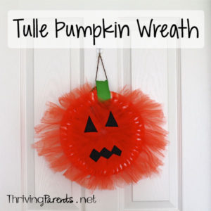 This tulle pumpkin wreath was a fun craft for our kids. It helped to develop their small motor skills and allowed them to use their creativity.